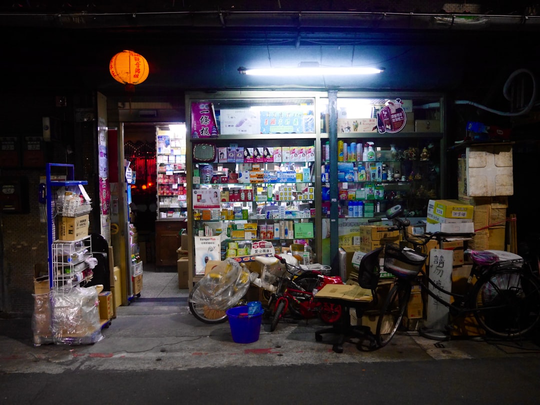 bikes parked beside store during night